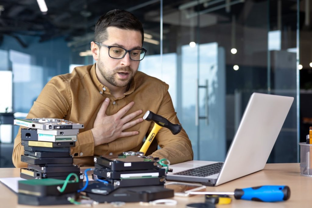 man sitting affront of the computer